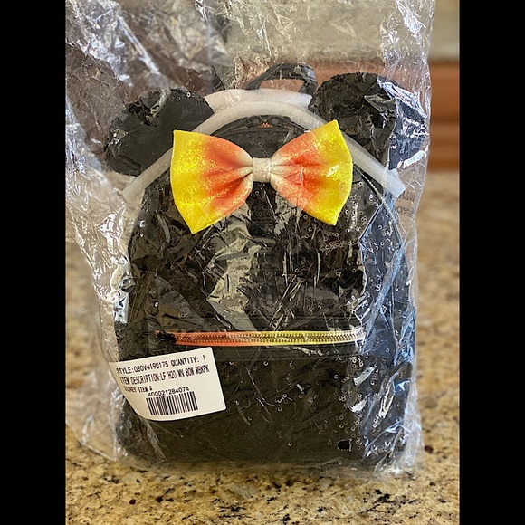 Loungefly Handbags - Loungefly Minnie Mouse Sequin Candy Corn Backpack